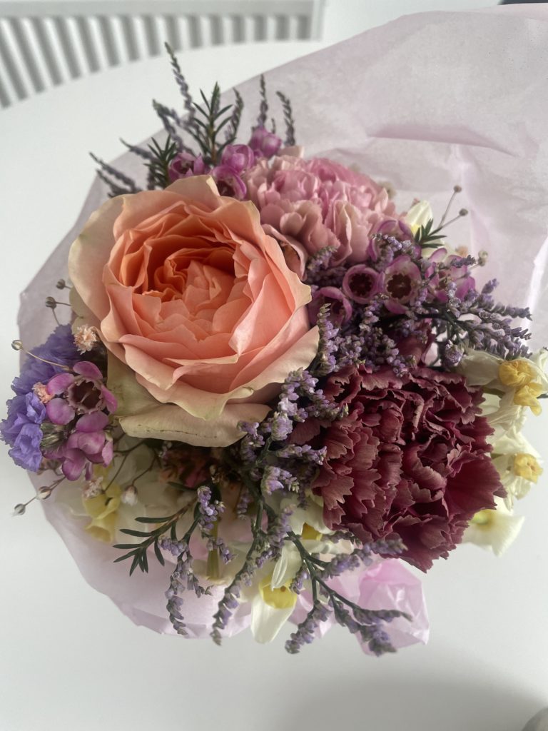 small posies to decorate tables at a funeral gathering